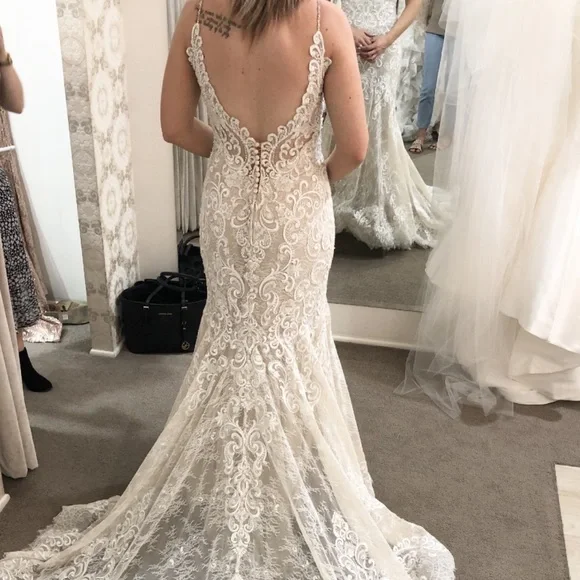 perfect sleeveless fit, lare gown,stylish classic taste.beautifully embroidered